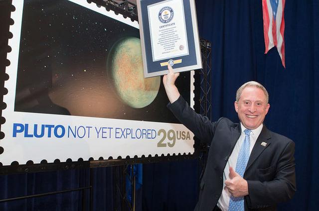 探测器携带邮票到冥王星创造吉尼斯世界纪录_WWW.TQQA.COM