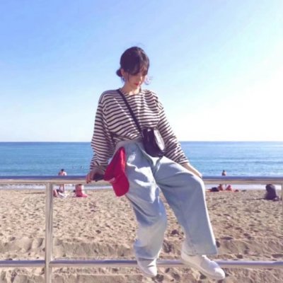 女生海边吹风图片头像_WWW.TQQA.COM