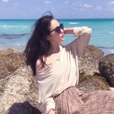 女生海边吹风图片头像_WWW.TQQA.COM