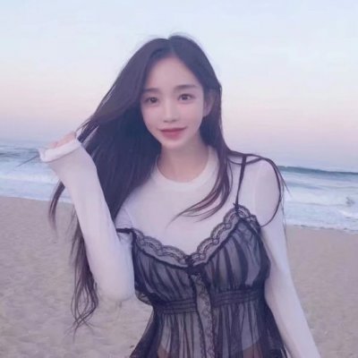 女生海边吹风图片头像_WWW.TQQA.COM