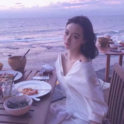 女生海边吹风图片头像_WWW.TQQA.COM
