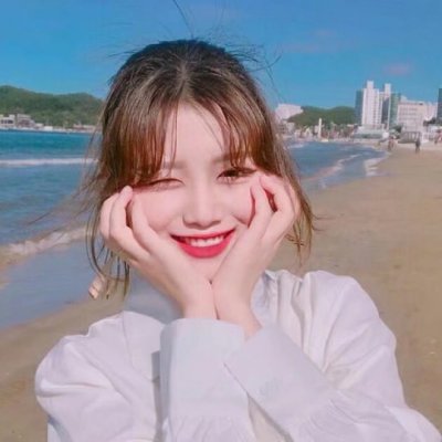 女生海边吹风图片头像_WWW.TQQA.COM