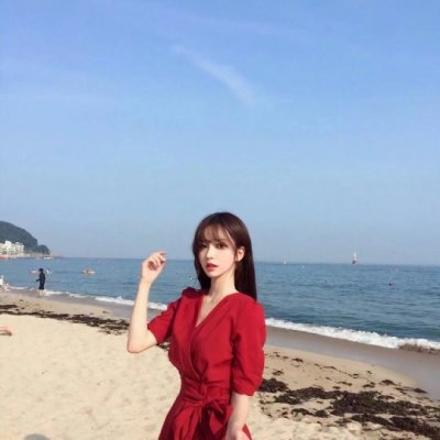 女生海边吹风图片头像_WWW.TQQA.COM