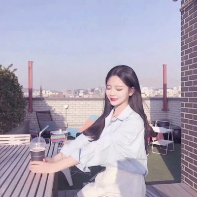 女生海边吹风图片头像_WWW.TQQA.COM